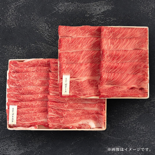 木製トレーに2種類の黒毛和牛薄切りスライスが整然と並び、鮮やかな赤身と美しい霜降りのコントラストが際立つ盛り付け